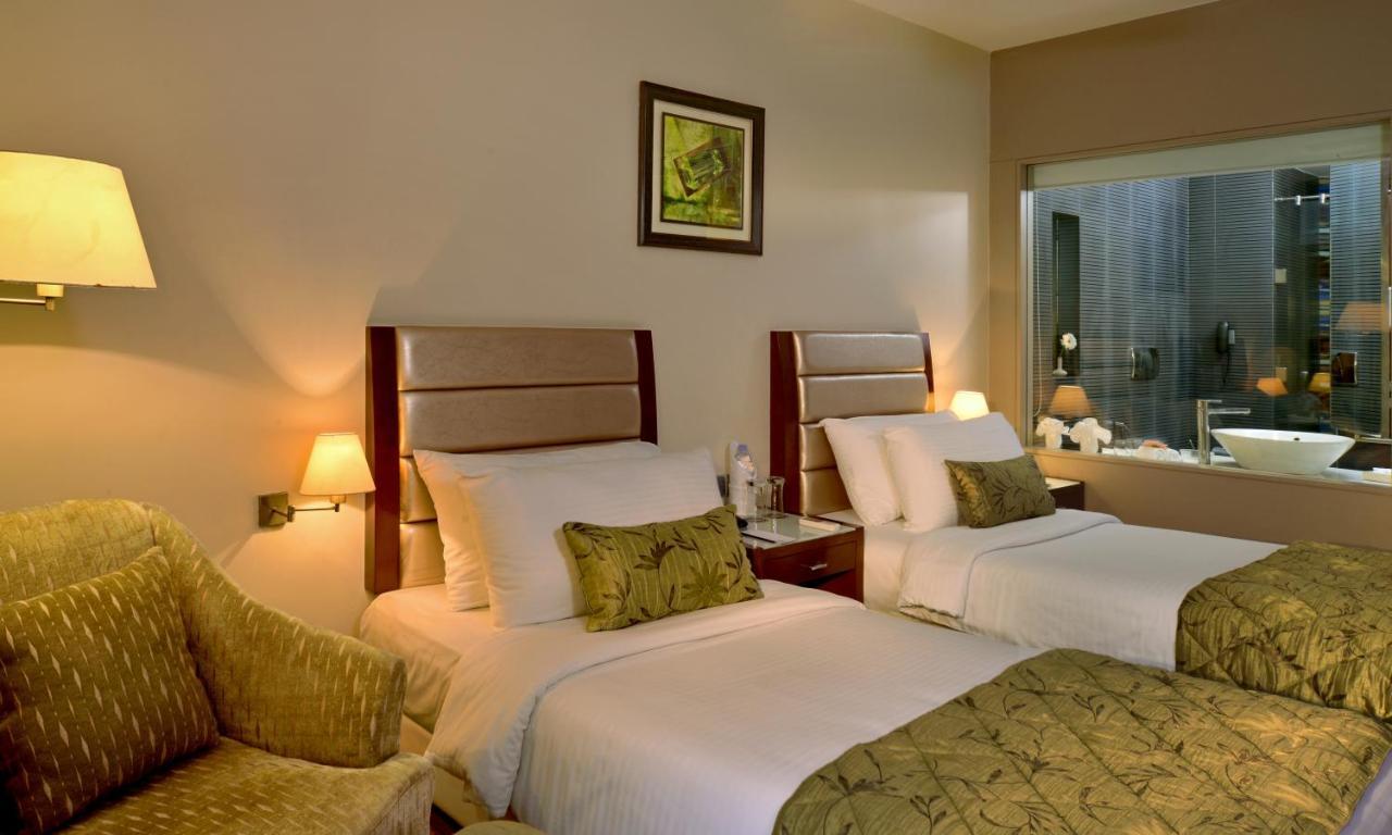 The Corinthians Resort And Club Πούνε Εξωτερικό φωτογραφία A room at the Taj Bengal